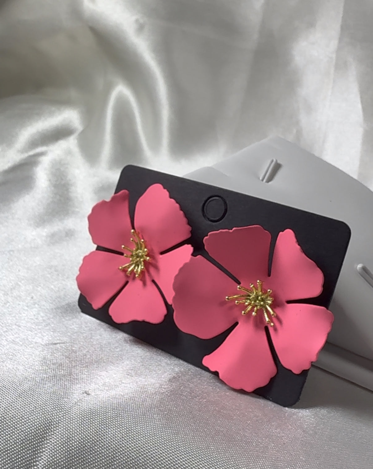 Boucle d’oreille rose bonbon
